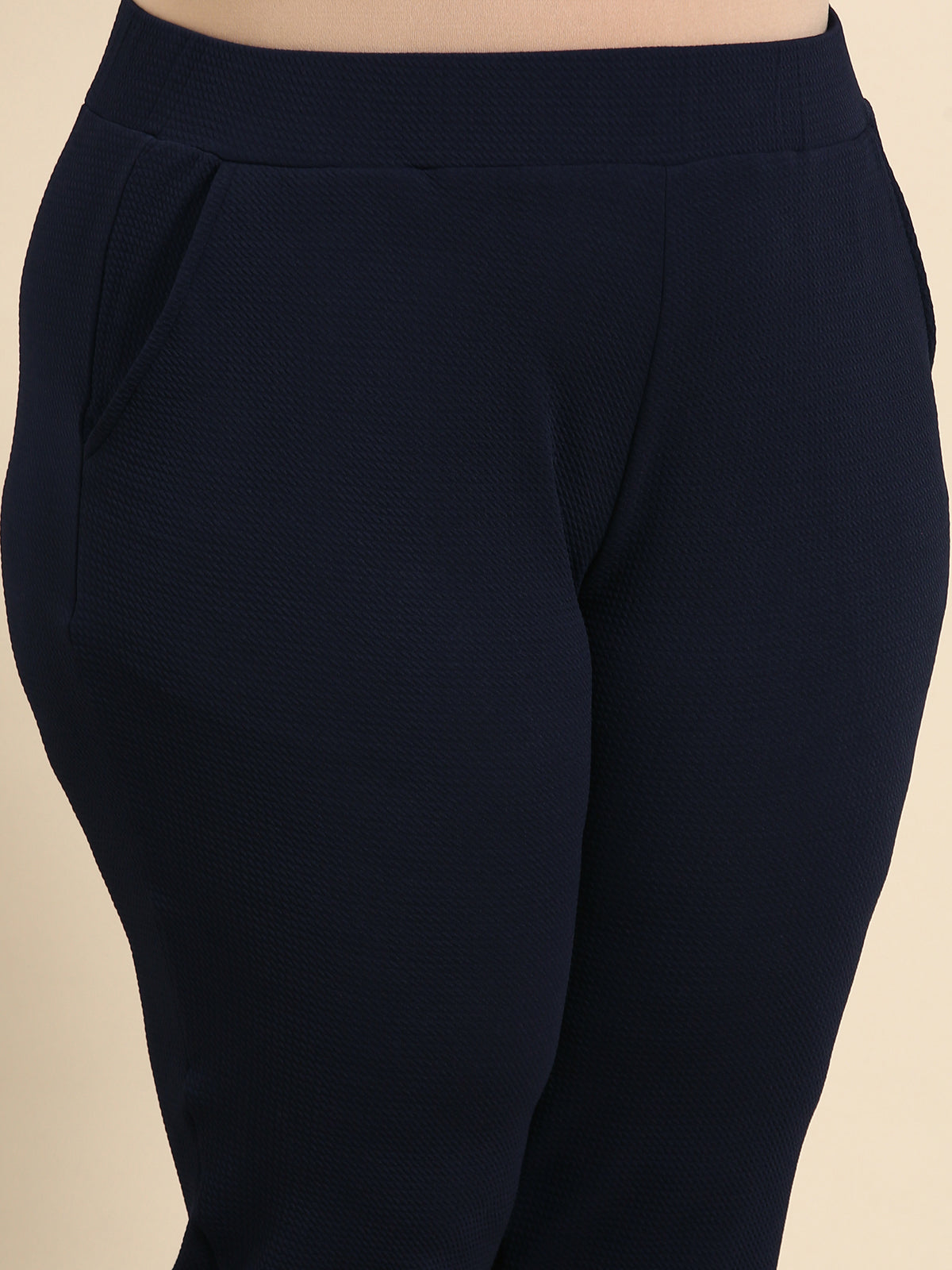 NAVY EMBOSSED STRETCH PANTS