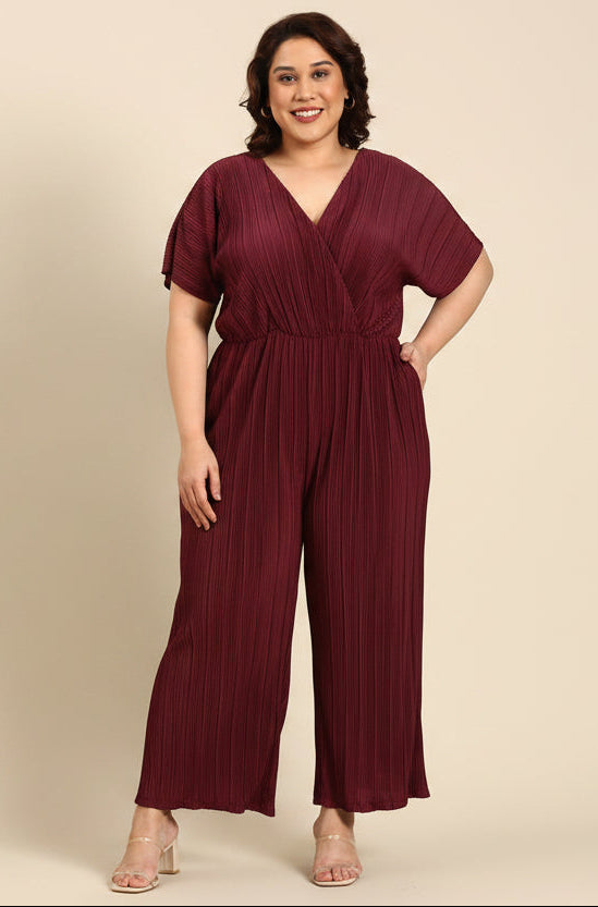 NAVY PLEAT JUMPSUIT